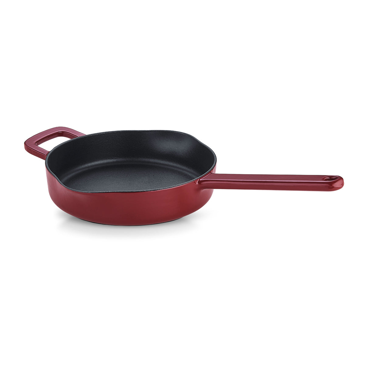 Fissler Moments Frying Pan made of red cast iron with a long handle and helper handle; smooth black interior for energy-saving, natural non-stick cooking.