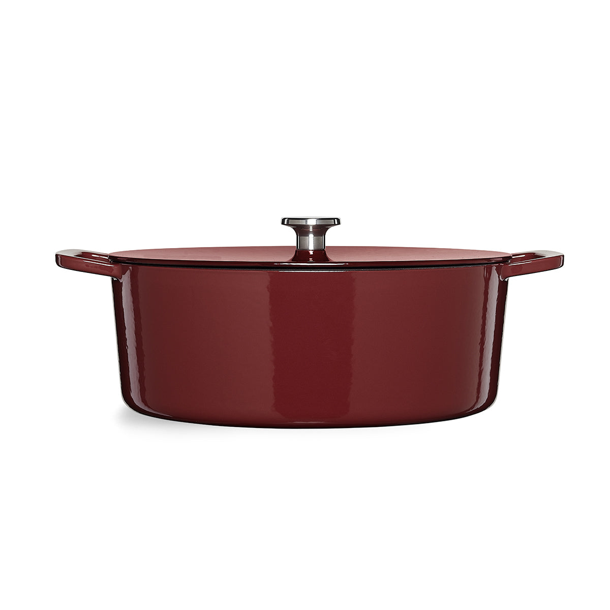 Fissler Moments Oval Dutch Oven in red cast iron - modern, durable, with silver knob and side handles. Precision "Made in Germany".