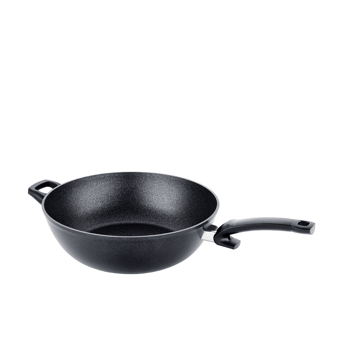 Fissler Adamant® Wok with durable non-stick coating, structured interior, short and long handles. Precision-made in Germany.