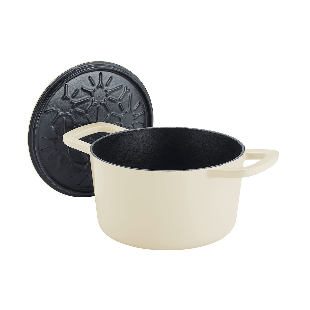 Fissler Moments Gusseisen Topf in creme, innen schwarz, Deckel hochkant zeigt energiesparendes Design. Zeitlos, hergestellt in Deutschland.